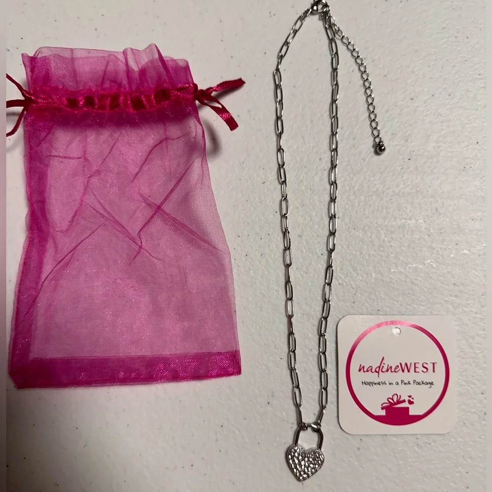 Never worn jewelry. Heart shaped studs, and heart necklace. Silver accessories. - Picture 2 of 2